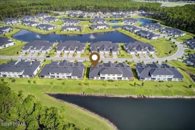 The Arbor II Townhome features a low-maintenance design with a on Plantation Bay Golf and Country Club in Florida - for sale on GolfHomes.com, golf home, golf lot