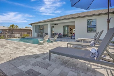 Experience modern Florida living at its finest in this stunning on Raptor Bay Golf Club in Florida - for sale on GolfHomes.com, golf home, golf lot