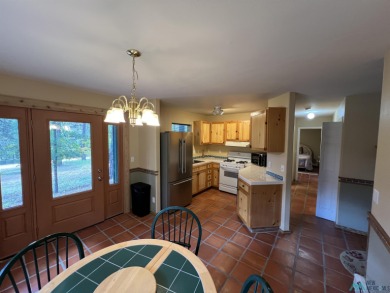 Discover this sweet mountain cabin perfectly situated along the on Pendaries Village Community Assoc. in New Mexico - for sale on GolfHomes.com, golf home, golf lot