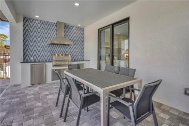 Experience modern Florida living at its finest in this stunning on Raptor Bay Golf Club in Florida - for sale on GolfHomes.com, golf home, golf lot