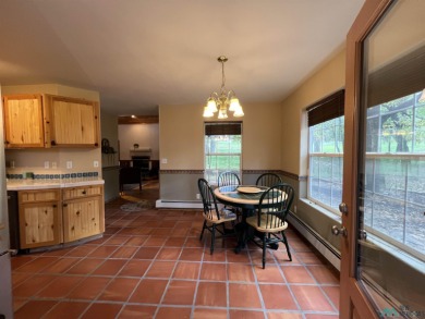 Discover this sweet mountain cabin perfectly situated along the on Pendaries Village Community Assoc. in New Mexico - for sale on GolfHomes.com, golf home, golf lot