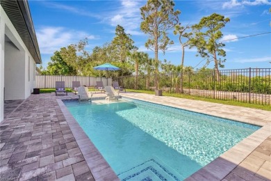 Experience modern Florida living at its finest in this stunning on Raptor Bay Golf Club in Florida - for sale on GolfHomes.com, golf home, golf lot