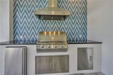 Experience modern Florida living at its finest in this stunning on Raptor Bay Golf Club in Florida - for sale on GolfHomes.com, golf home, golf lot
