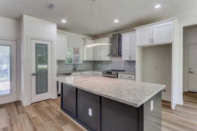 Discover modern comfort and style in this beautifully built new on The Club At Runaway Bay in Texas - for sale on GolfHomes.com, golf home, golf lot