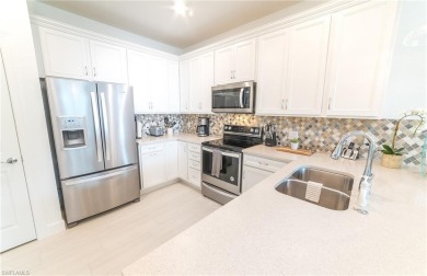 Move-in ready and designer-furnished, this former model home is on Panther Run Golf Club in Florida - for sale on GolfHomes.com, golf home, golf lot