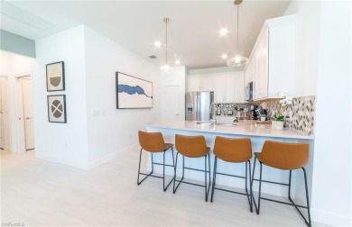 Move-in ready and designer-furnished, this former model home is on Panther Run Golf Club in Florida - for sale on GolfHomes.com, golf home, golf lot