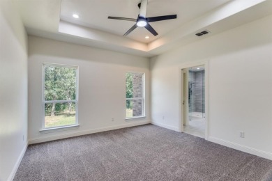 Discover modern comfort and style in this beautifully built new on The Club At Runaway Bay in Texas - for sale on GolfHomes.com, golf home, golf lot