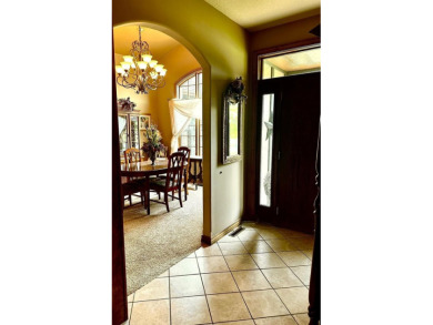This stunning custom built home by K.G. Day Builders has on Winfield Country Club in Kansas - for sale on GolfHomes.com, golf home, golf lot