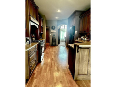 This stunning custom built home by K.G. Day Builders has on Winfield Country Club in Kansas - for sale on GolfHomes.com, golf home, golf lot
