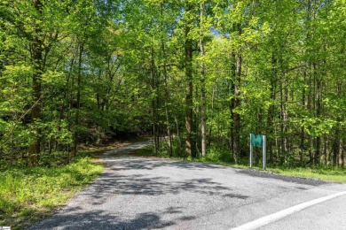 Discover your dream retreat on this stunning 0.95-acre wooded on The Cliffs Valley in North Carolina - for sale on GolfHomes.com, golf home, golf lot