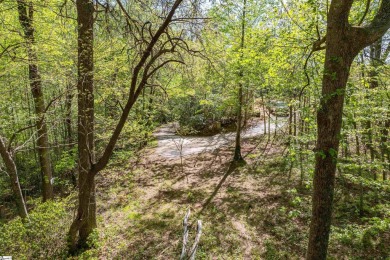 Discover your dream retreat on this stunning 0.95-acre wooded on The Cliffs Valley in North Carolina - for sale on GolfHomes.com, golf home, golf lot