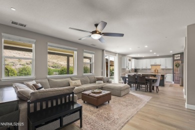 The spacious primary suite includes a private balcony where you on DAndrea Golf Club in Nevada - for sale on GolfHomes.com, golf home, golf lot