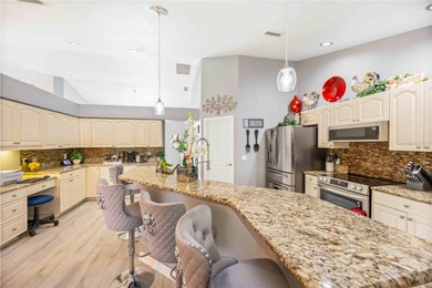 Stunning and elegantly updated home offering tranquil water on Rotonda Golf and Country Club - Long Marsh  in Florida - for sale on GolfHomes.com, golf home, golf lot