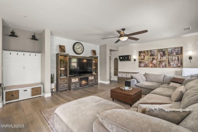 The spacious primary suite includes a private balcony where you on DAndrea Golf Club in Nevada - for sale on GolfHomes.com, golf home, golf lot