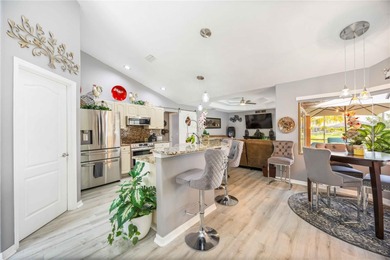 Stunning and elegantly updated home offering tranquil water on Rotonda Golf and Country Club - Long Marsh  in Florida - for sale on GolfHomes.com, golf home, golf lot