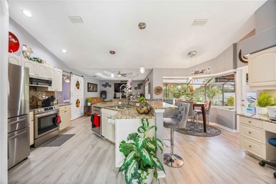 Stunning and elegantly updated home offering tranquil water on Rotonda Golf and Country Club - Long Marsh  in Florida - for sale on GolfHomes.com, golf home, golf lot