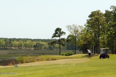 Enjoy building your custom home on a beautifully wooded golf on Rivers Edge Golf Club in North Carolina - for sale on GolfHomes.com, golf home, golf lot