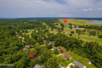 Exquisite move in ready brick home adjacent to Morehead City on Morehead City Country Club in North Carolina - for sale on GolfHomes.com, golf home, golf lot