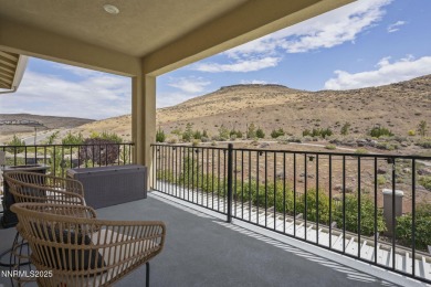 The spacious primary suite includes a private balcony where you on DAndrea Golf Club in Nevada - for sale on GolfHomes.com, golf home, golf lot