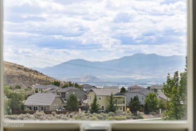 The spacious primary suite includes a private balcony where you on DAndrea Golf Club in Nevada - for sale on GolfHomes.com, golf home, golf lot
