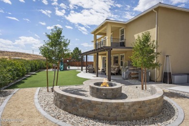 The spacious primary suite includes a private balcony where you on DAndrea Golf Club in Nevada - for sale on GolfHomes.com, golf home, golf lot