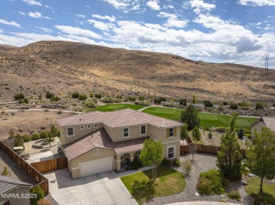 The spacious primary suite includes a private balcony where you on DAndrea Golf Club in Nevada - for sale on GolfHomes.com, golf home, golf lot