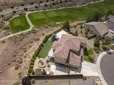 The spacious primary suite includes a private balcony where you on DAndrea Golf Club in Nevada - for sale on GolfHomes.com, golf home, golf lot