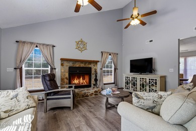 This home is situated on an expansive 3/4-acre homesite in one on Carolina Shores Golf Course in North Carolina - for sale on GolfHomes.com, golf home, golf lot