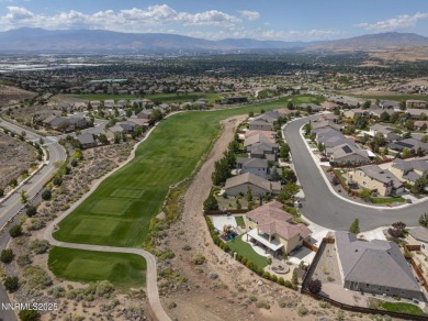 The spacious primary suite includes a private balcony where you on DAndrea Golf Club in Nevada - for sale on GolfHomes.com, golf home, golf lot