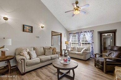 This home is situated on an expansive 3/4-acre homesite in one on Carolina Shores Golf Course in North Carolina - for sale on GolfHomes.com, golf home, golf lot