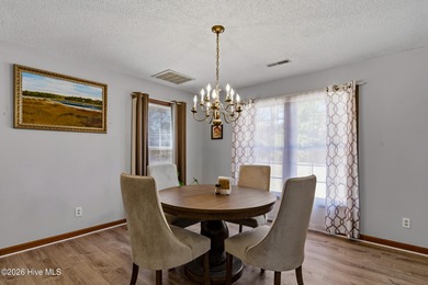 This home is situated on an expansive 3/4-acre homesite in one on Carolina Shores Golf Course in North Carolina - for sale on GolfHomes.com, golf home, golf lot