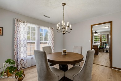 This home is situated on an expansive 3/4-acre homesite in one on Carolina Shores Golf Course in North Carolina - for sale on GolfHomes.com, golf home, golf lot