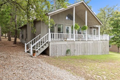 Motivated Seller offering $3500 towards the initation fee and on Holly Lake Ranch Golf Club in Texas - for sale on GolfHomes.com, golf home, golf lot