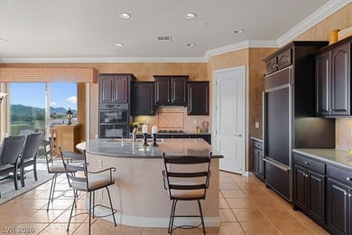 Enjoy sweeping mountain and golf course views that capture the on Reflection Bay Golf Club in Nevada - for sale on GolfHomes.com, golf home, golf lot