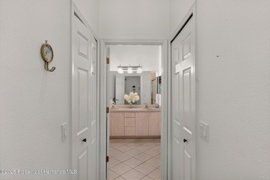 This end-unit Sea Breeze Villa nestled within Pine Meadow on Heritage Pines Country Club in Florida - for sale on GolfHomes.com, golf home, golf lot