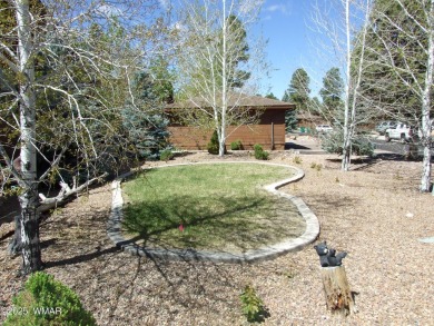 Gorgeous getaway in the beautiful White Mountains of Arizona on Bison Golf and Country Club in Arizona - for sale on GolfHomes.com, golf home, golf lot