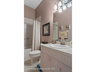 This end-unit Sea Breeze Villa nestled within Pine Meadow on Heritage Pines Country Club in Florida - for sale on GolfHomes.com, golf home, golf lot