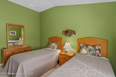 This end-unit Sea Breeze Villa nestled within Pine Meadow on Heritage Pines Country Club in Florida - for sale on GolfHomes.com, golf home, golf lot