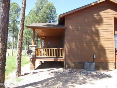 Gorgeous getaway in the beautiful White Mountains of Arizona on Bison Golf and Country Club in Arizona - for sale on GolfHomes.com, golf home, golf lot