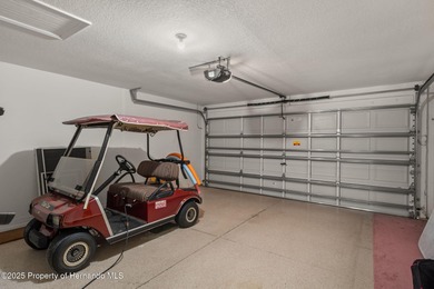 This end-unit Sea Breeze Villa nestled within Pine Meadow on Heritage Pines Country Club in Florida - for sale on GolfHomes.com, golf home, golf lot