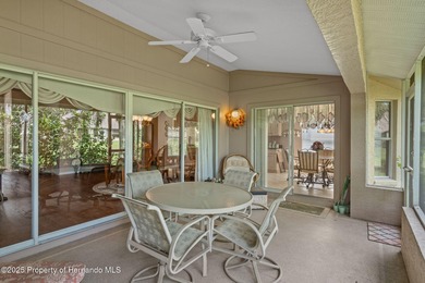 This end-unit Sea Breeze Villa nestled within Pine Meadow on Heritage Pines Country Club in Florida - for sale on GolfHomes.com, golf home, golf lot