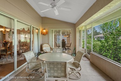 This end-unit Sea Breeze Villa nestled within Pine Meadow on Heritage Pines Country Club in Florida - for sale on GolfHomes.com, golf home, golf lot