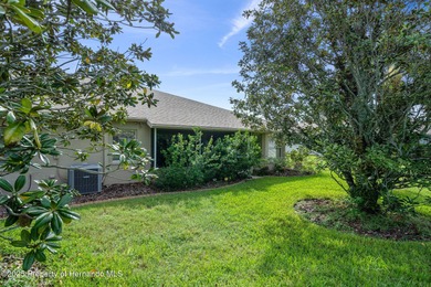 This end-unit Sea Breeze Villa nestled within Pine Meadow on Heritage Pines Country Club in Florida - for sale on GolfHomes.com, golf home, golf lot