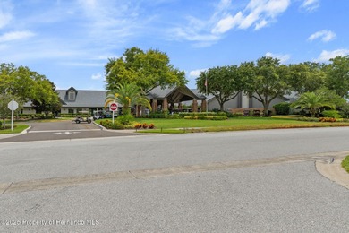 This end-unit Sea Breeze Villa nestled within Pine Meadow on Heritage Pines Country Club in Florida - for sale on GolfHomes.com, golf home, golf lot