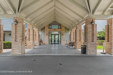 This end-unit Sea Breeze Villa nestled within Pine Meadow on Heritage Pines Country Club in Florida - for sale on GolfHomes.com, golf home, golf lot