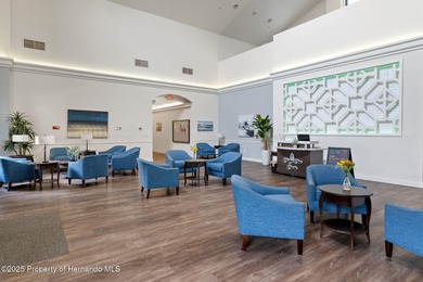 This end-unit Sea Breeze Villa nestled within Pine Meadow on Heritage Pines Country Club in Florida - for sale on GolfHomes.com, golf home, golf lot