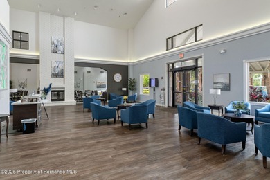 This end-unit Sea Breeze Villa nestled within Pine Meadow on Heritage Pines Country Club in Florida - for sale on GolfHomes.com, golf home, golf lot