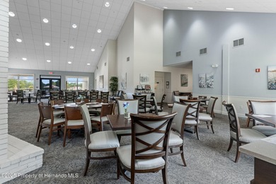 This end-unit Sea Breeze Villa nestled within Pine Meadow on Heritage Pines Country Club in Florida - for sale on GolfHomes.com, golf home, golf lot