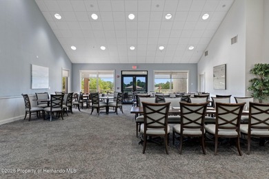 This end-unit Sea Breeze Villa nestled within Pine Meadow on Heritage Pines Country Club in Florida - for sale on GolfHomes.com, golf home, golf lot