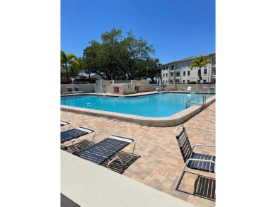 Mediterranean Manors, located at Dunedin is a water front on The Dunedin Country Club in Florida - for sale on GolfHomes.com, golf home, golf lot